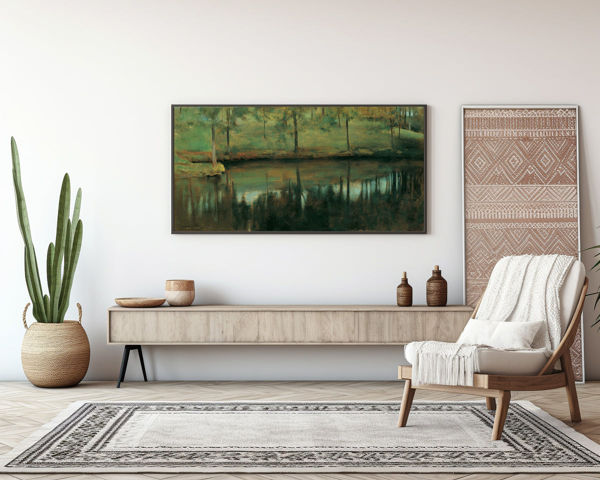 Framed art print of Still Water by Fernand Khnopff, above a sideboard in a living room