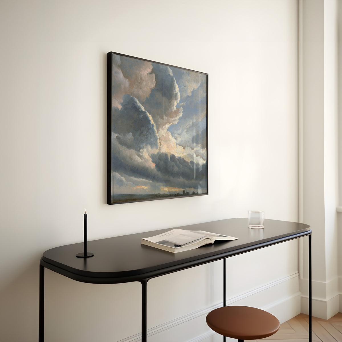 Study of Clouds with a Sunset near Rome by Simon Denis — framed above a slim black console table