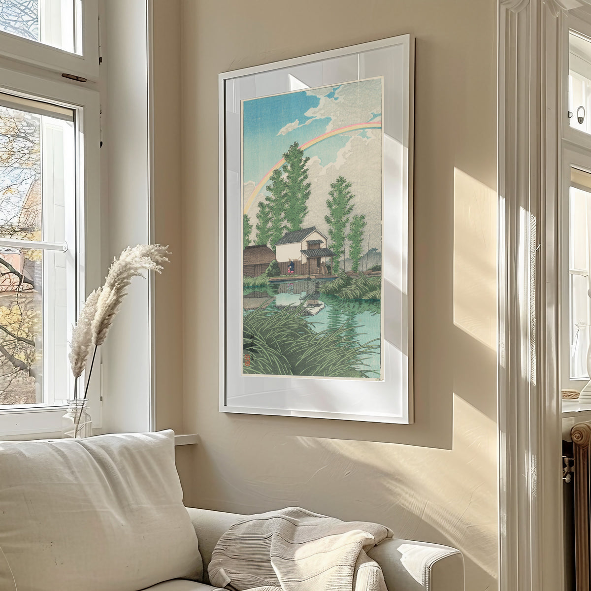 Framed art print of Summer at Itako by Kawase Hasui, in a sunlit living room above a sofa