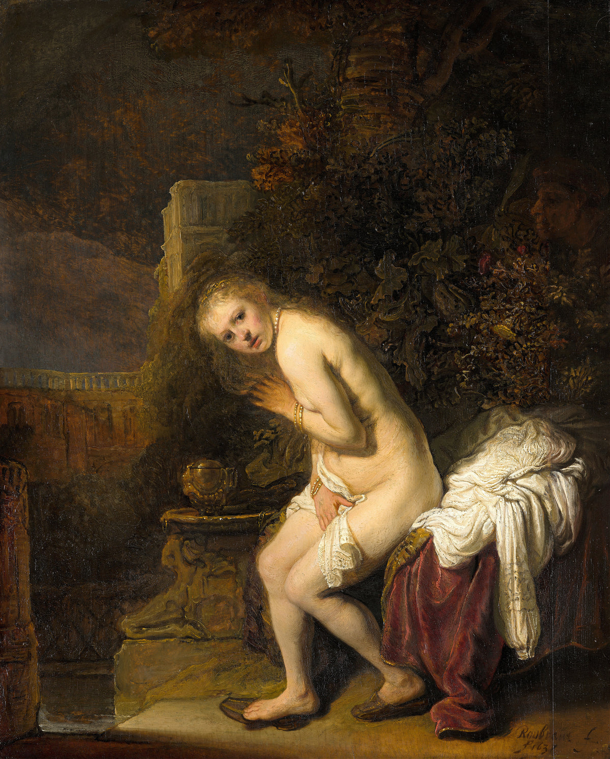 Susanna by Rembrandt van Rijn — A startled young woman at her bath glances back as a face peers out