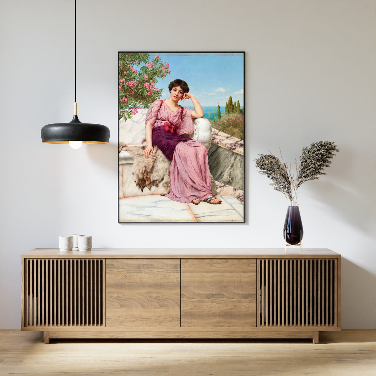 Framed art print of Sweet Dreams by John William Godward, above a slatted wood sideboard