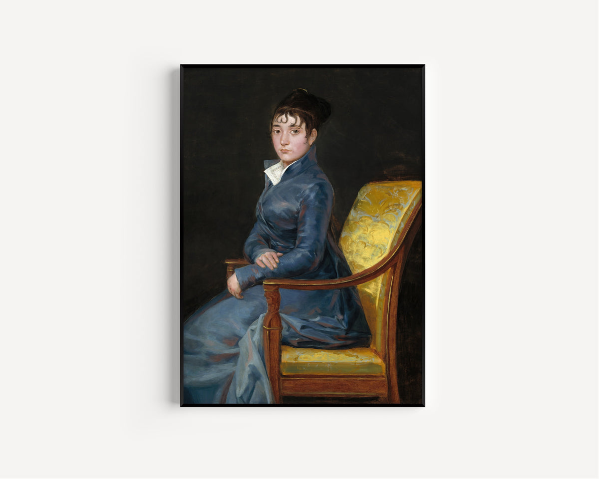 Framed art print of Thérèse Louise de Sureda by Francisco de Goya, in a slim black frame on a plain white wall