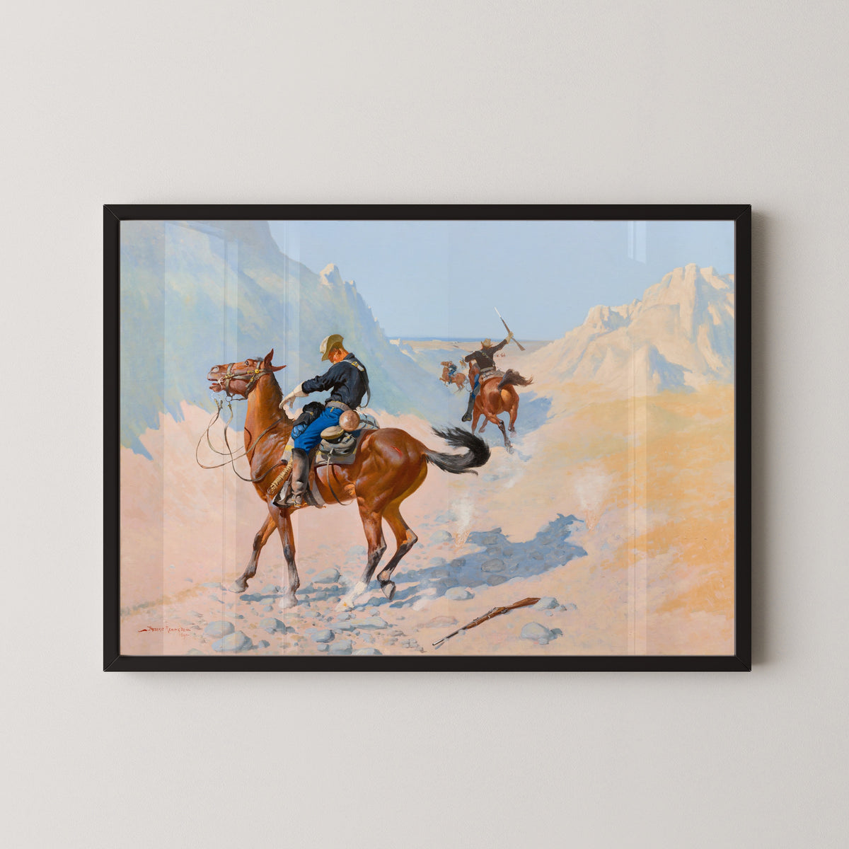 The Advance-Guard, or The Military Sacrifice by Frederic Remington — in a black frame on a pale wall