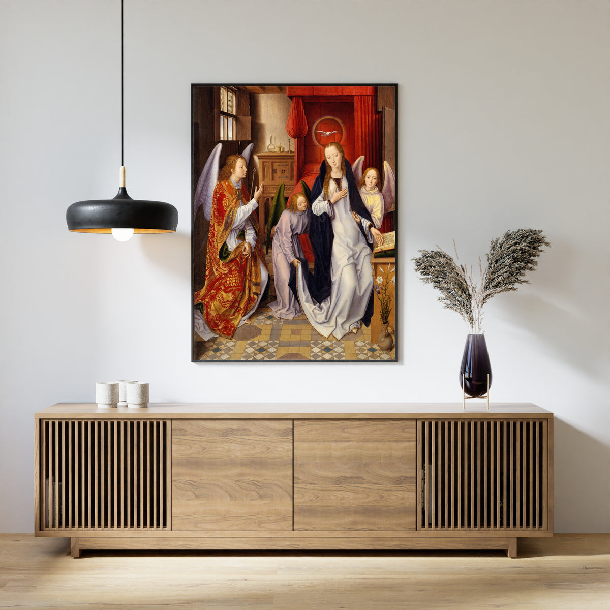 Framed art print of The Annunciation by Hans Memling, above a slatted wood sideboard