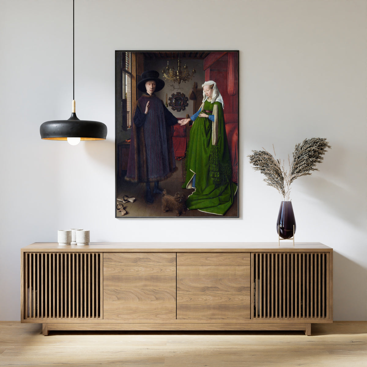 Framed art print of The Arnolfini Portrait by Jan van Eyck, above a slatted wood sideboard