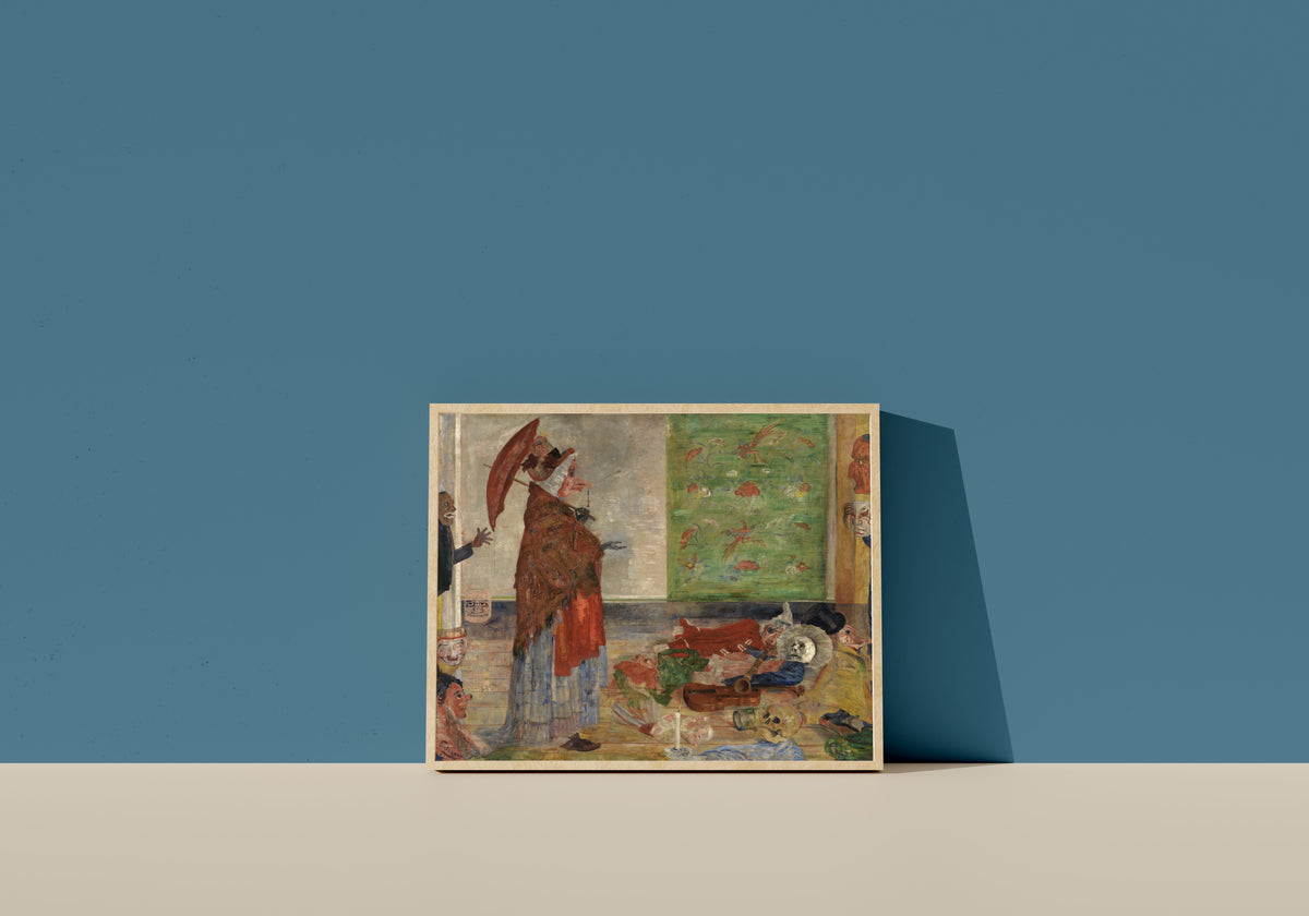 Framed art print of The Astonishment of the Mask Wouse by James Ensor, in a light wood frame leaning on a blue wall