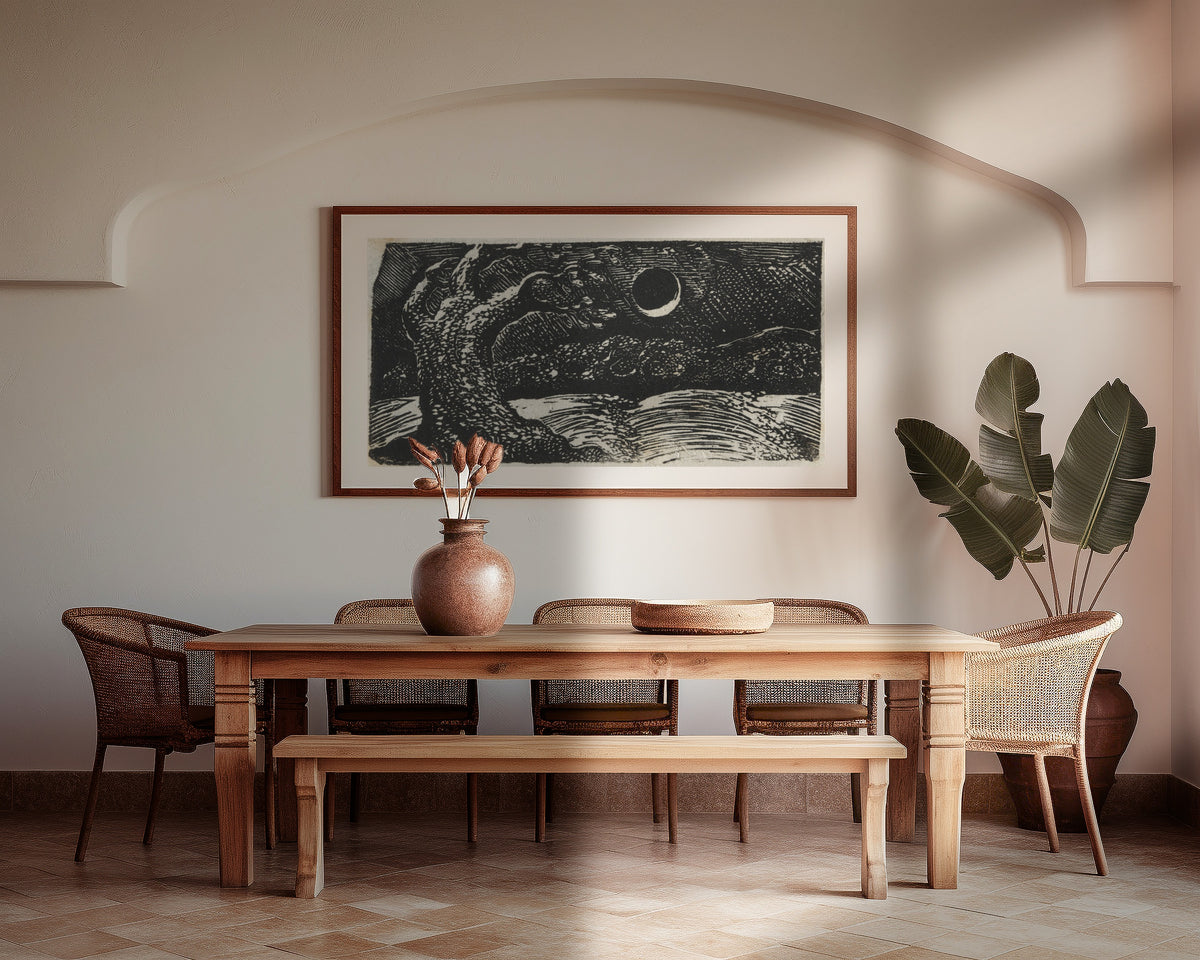 Framed art print of The Blasted Tree (Pastorals of Virgil) by William Blake, above a wooden dining table