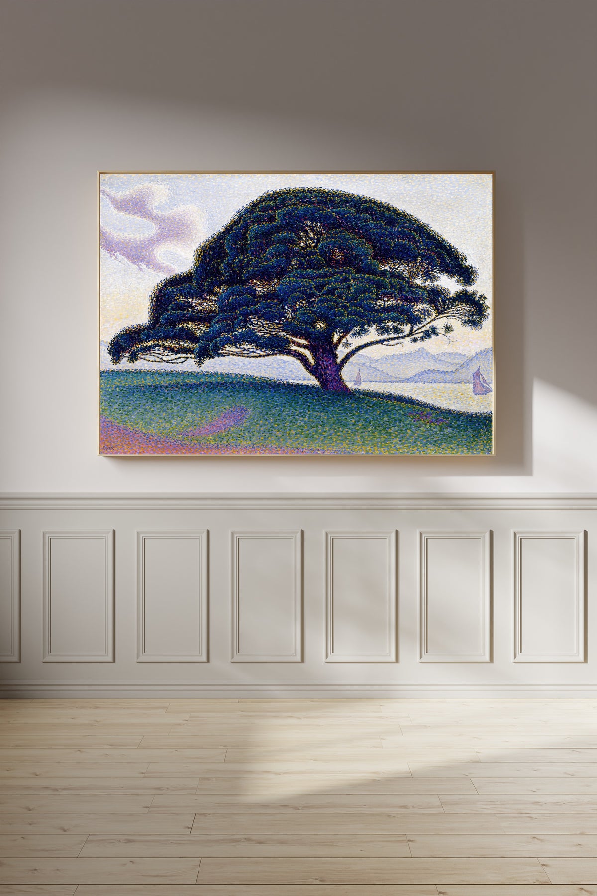 Framed art print of The Bonaventure Pine by Paul Signac, on a panelled wall in afternoon light