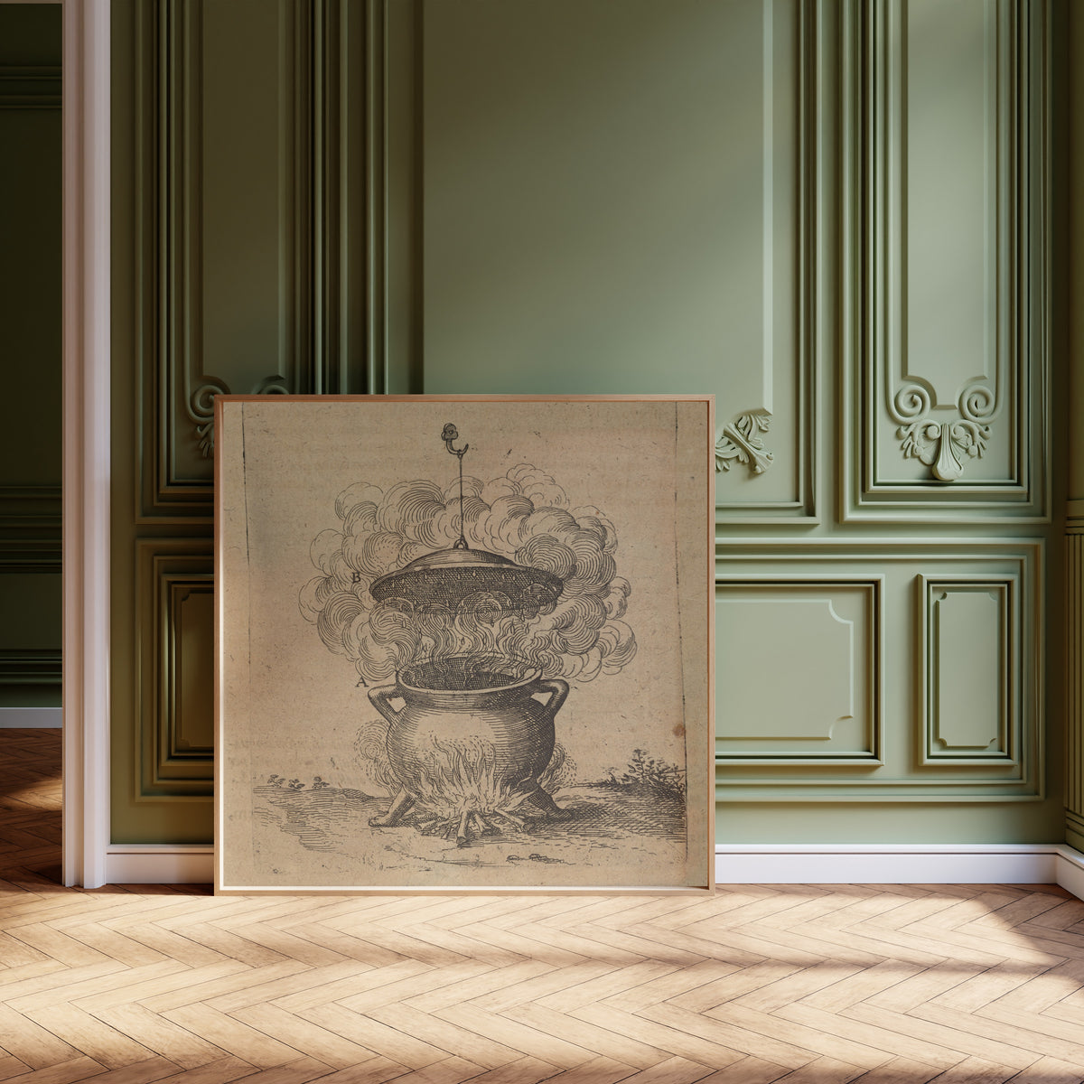 Framed art print of The Cauldron of Imperfect Mixtures over a Fire (Utriusque… by Robert Fludd, leaning against olive-green panelling on a herringbone floor