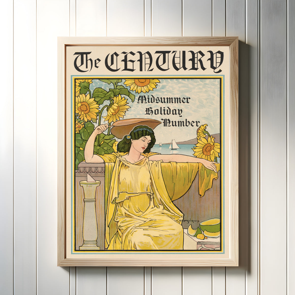 Framed art print of The Century, Midsummer Holiday Number by Louis Rhead, in a light wood frame on a white panelled wall
