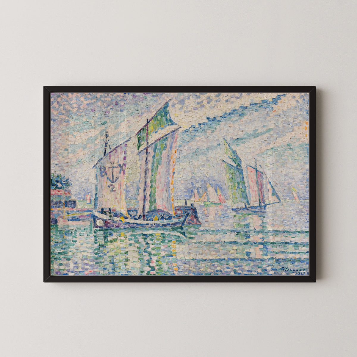 Framed art print of The Channel at La Rochelle by Paul Signac, in a black frame on a pale wall