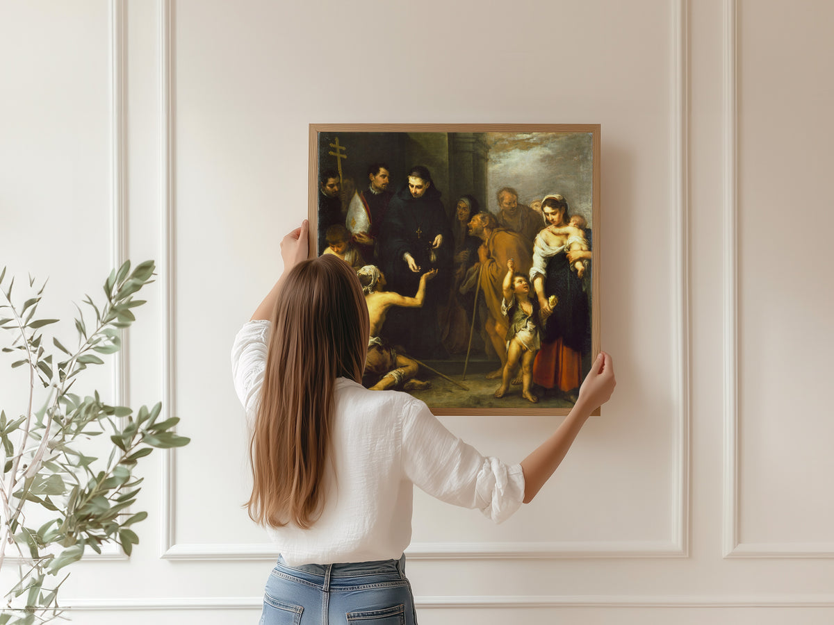 Framed art print of The Charity of Saint Thomas of Villanueva by Bartolomé Esteban Murillo, hung on a panelled wall