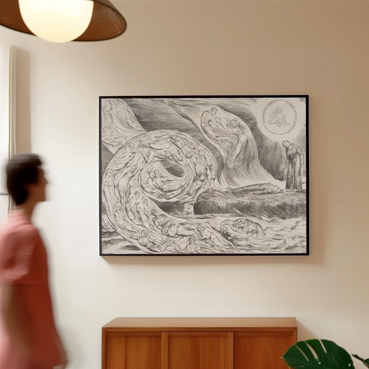 Framed art print of The Circle of the Lustful: Paolo and Francesca by William Blake, in a slim black frame on a warm wall in a sunlit room