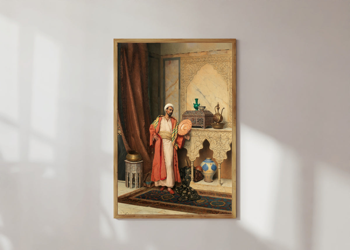 Framed art print of The Connoisseur by Ludwig Deutsch, in a light wood frame on a sunlit white wall