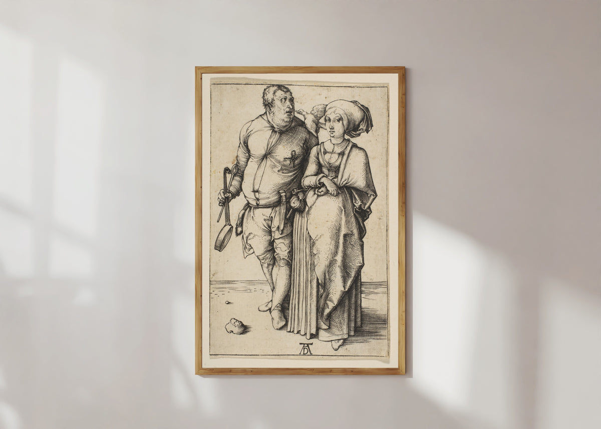 Framed art print of The Cook and His Wife by Albrecht Dürer, in a light wood frame on a sunlit white wall