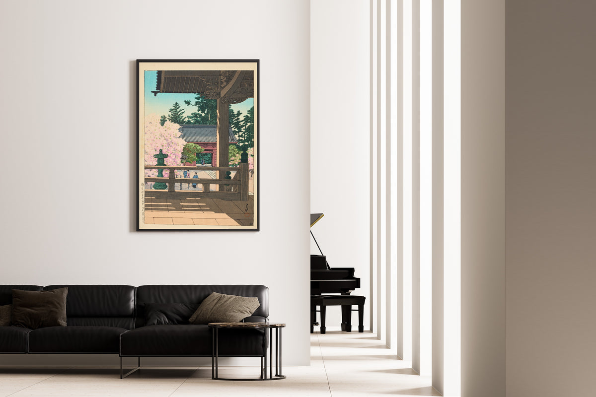 Framed art print of The Crabapple Flowers in Myohonji Temple, Kamakura by Kawase Hasui, on the wall of a minimal living room