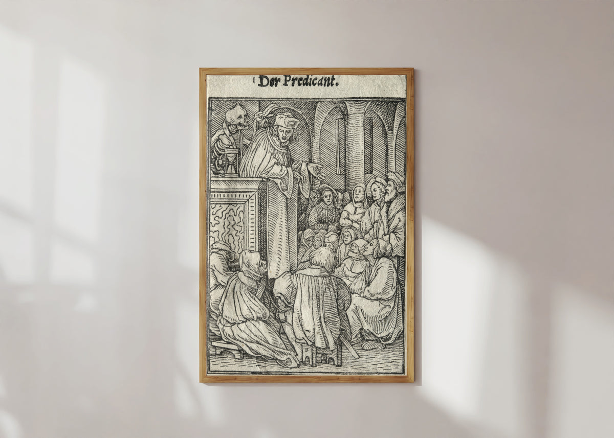 Framed art print of The Dance of Death: Der Predicant (The Preacher) by Hans Holbein the Younger, in a light wood frame on a sunlit white wall