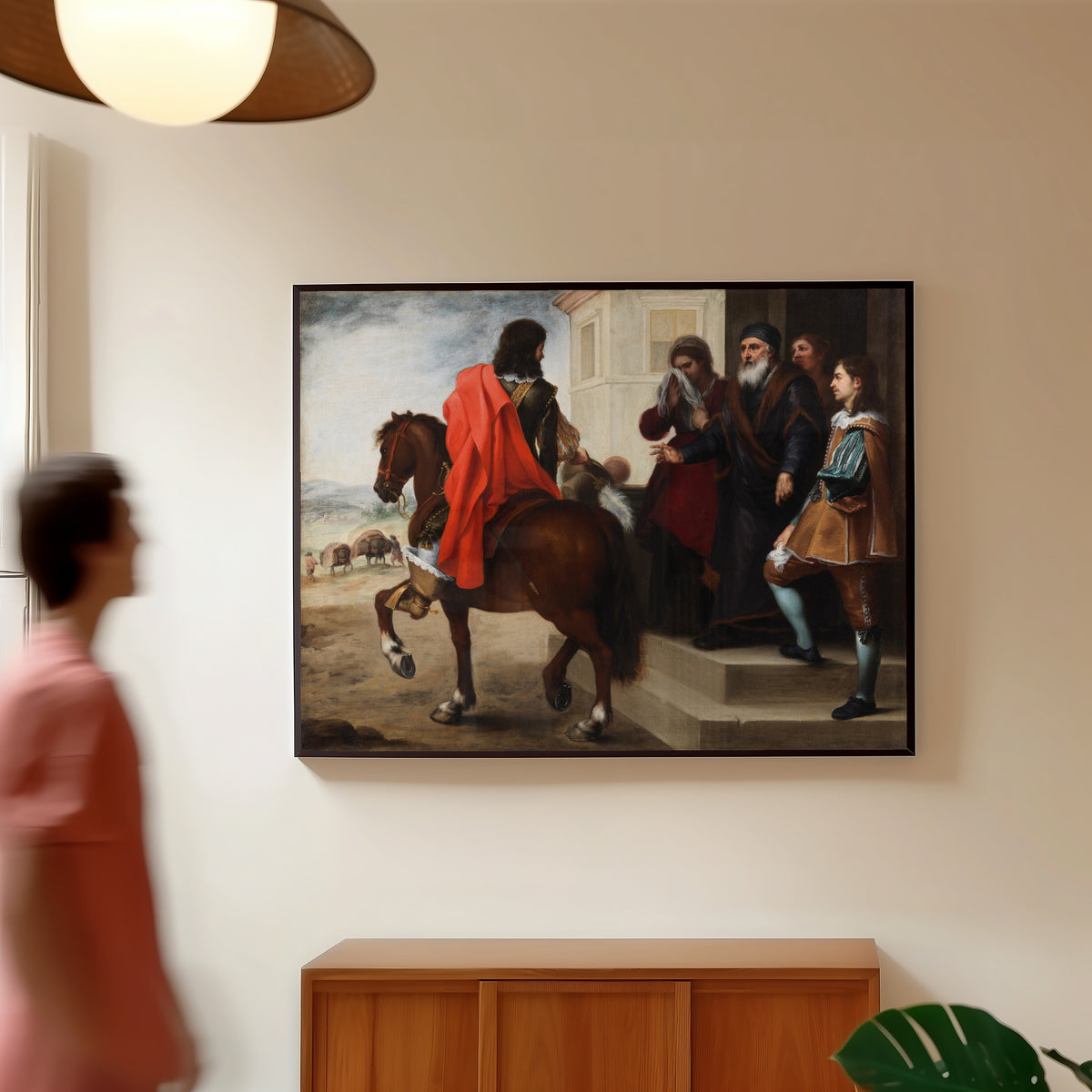 Framed art print of The Departure of the Prodigal Son by Bartolomé Esteban Murillo, in a slim black frame on a warm wall in a sunlit room