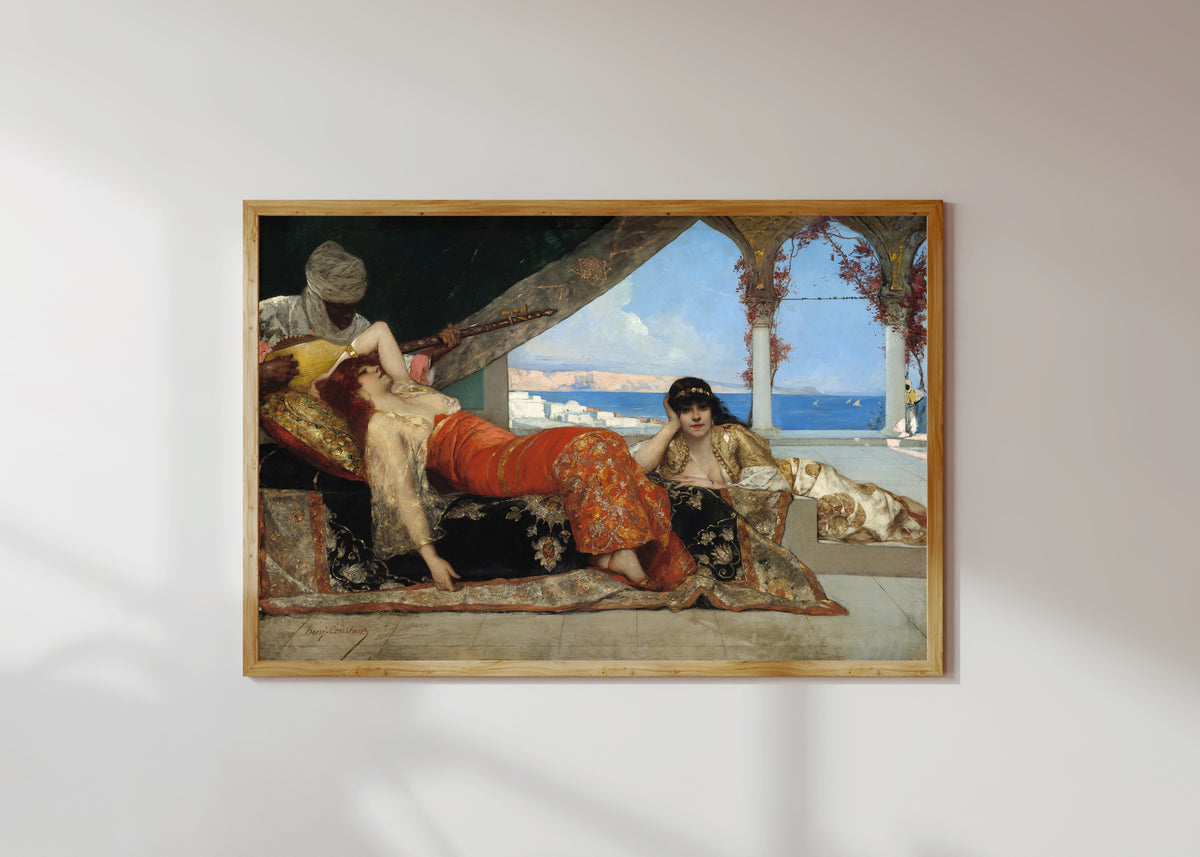 Framed art print of The Favorite of the Emir by Jean-Joseph Benjamin-Constant, in a light wood frame on a sunlit white wall