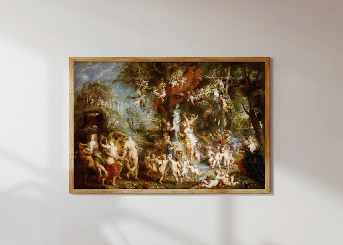 Framed art print of The Feast of Venus by Peter Paul Rubens, in a light wood frame on a sunlit white wall