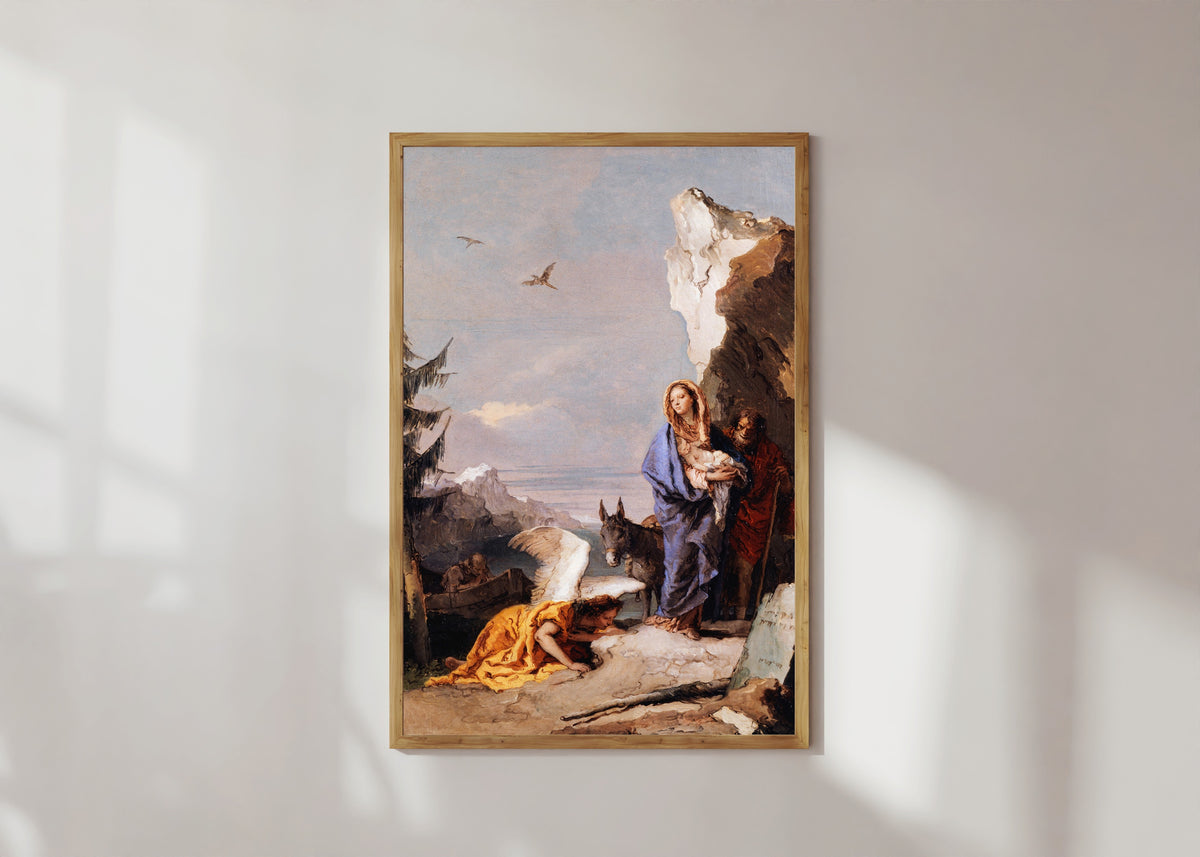 Framed art print of The Flight into Egypt by Giovanni Battista Tiepolo, in a light wood frame on a sunlit white wall