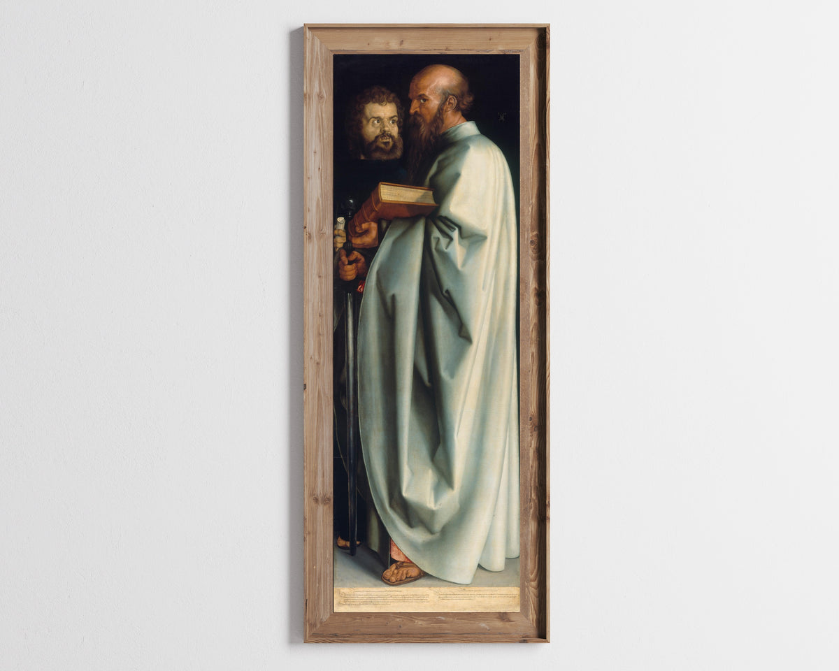 Framed art print of The Four Apostles: St Mark and St Paul by Albrecht Dürer, in a tall wooden frame on a pale wall