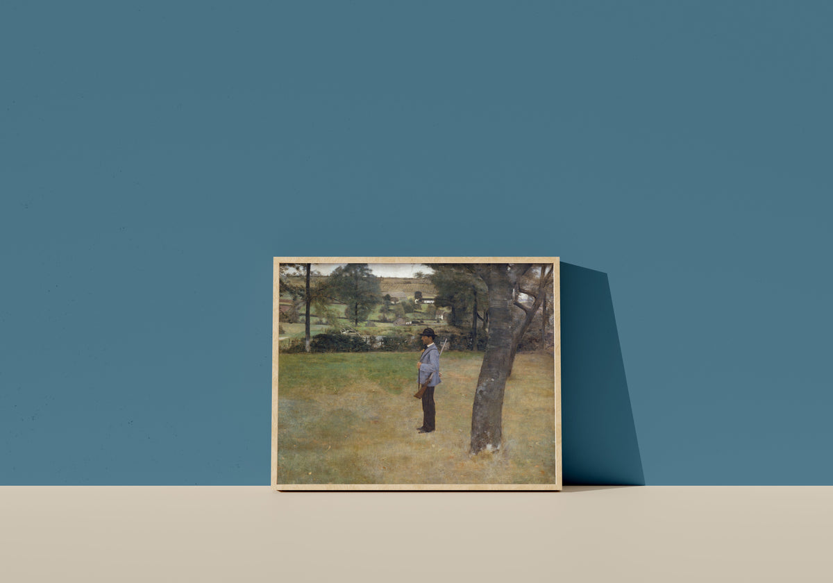 Framed art print of The Game Warden by Fernand Khnopff, in a light wood frame leaning on a blue wall