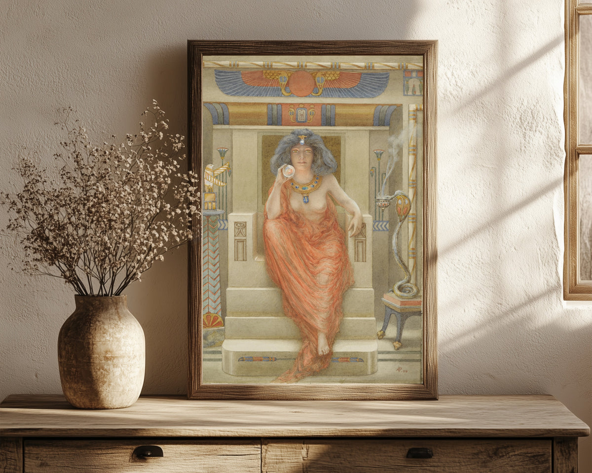 Framed art print of The Goddess Isis by Armand Point, in a dark wood frame leaning on a rustic console beside dried flowers