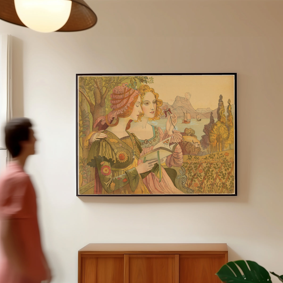 Framed art print of The Golden Legend by Armand Point, in a slim black frame on a warm wall in a sunlit room