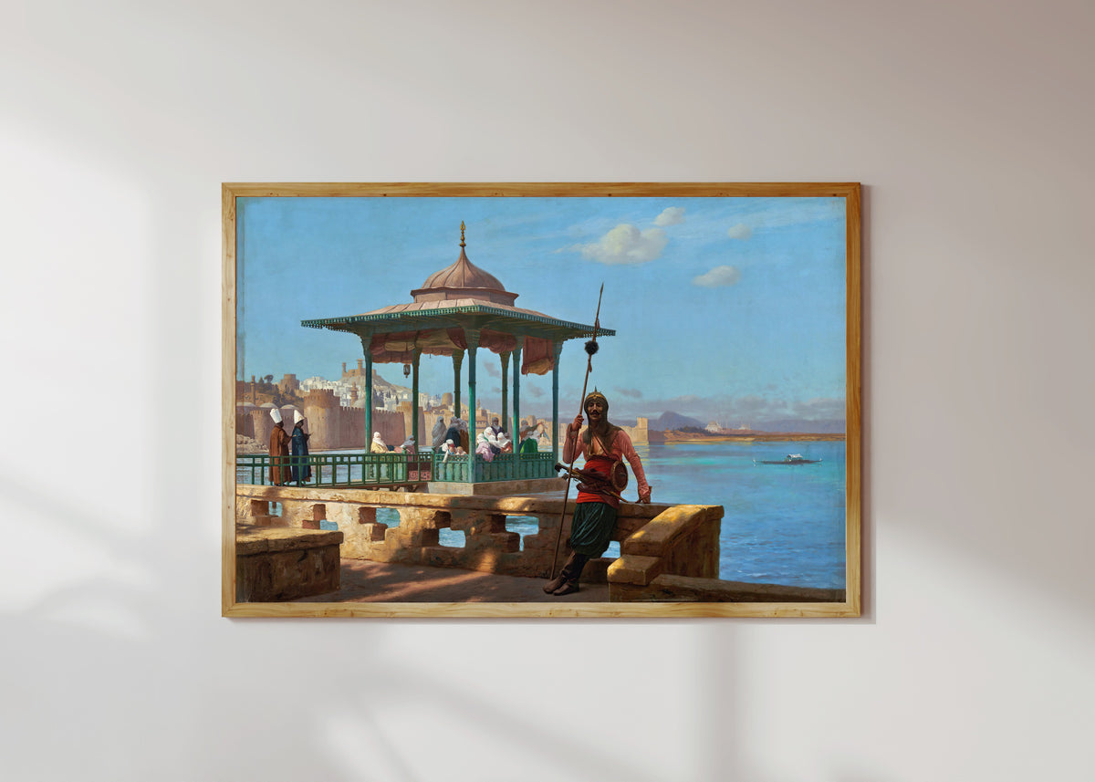 Framed art print of The Harem in the Kiosk by Jean-Léon Gérôme, in a light wood frame on a sunlit white wall