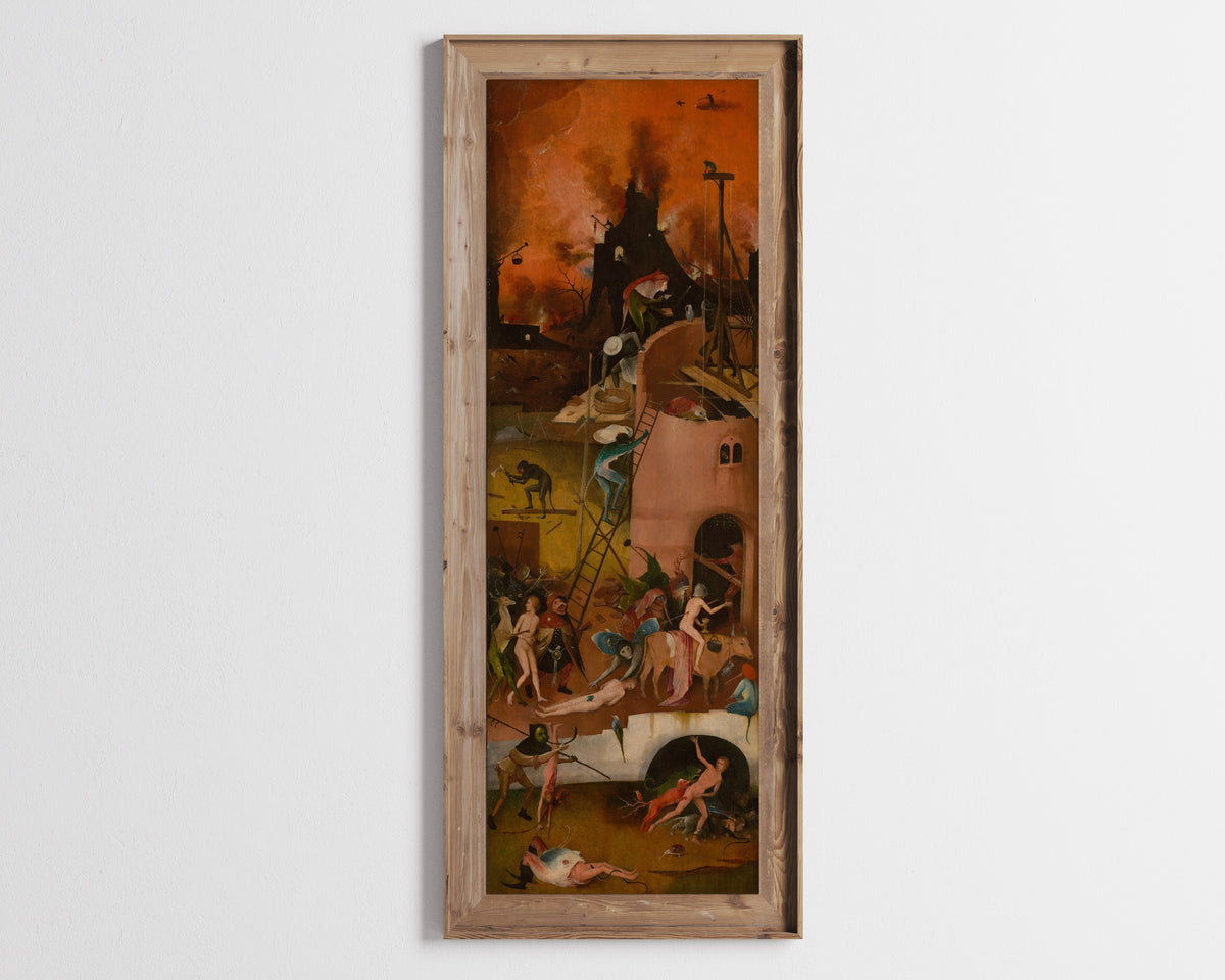 Framed art print of The Haywain Triptych - Hell (right wing) by Hieronymus Bosch, in a tall wooden frame on a pale wall