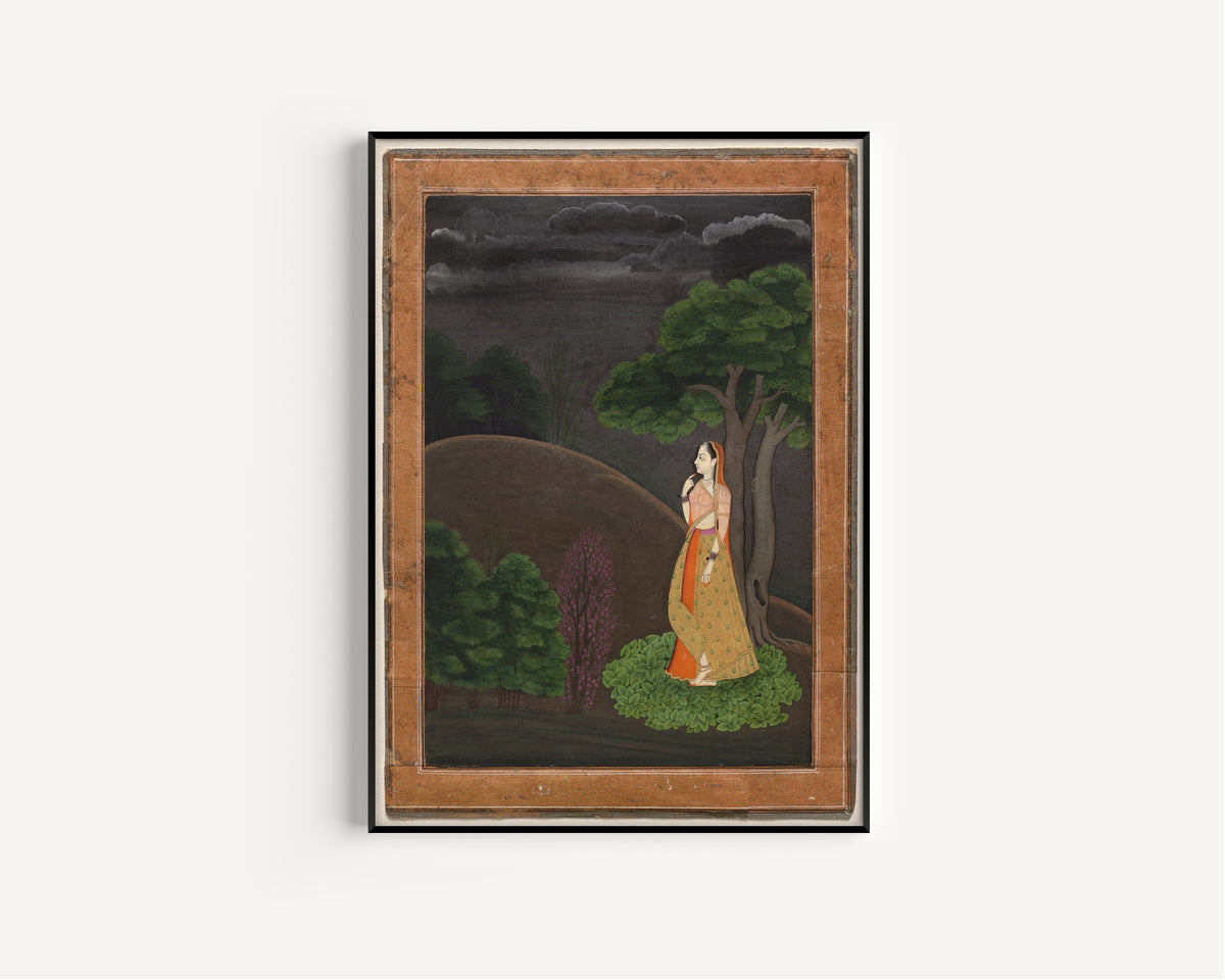 Framed art print of The Heroine Who Waits Anxiously for Her Absent Lover: Utka Nayika (Under a… by Pahari school, in a slim black frame on a plain white wall