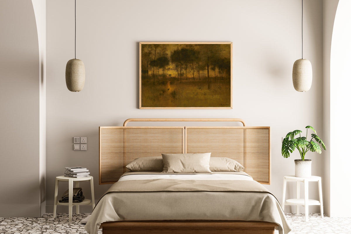 The Home of the Heron by George Inness — framed above a cane-headboard bed