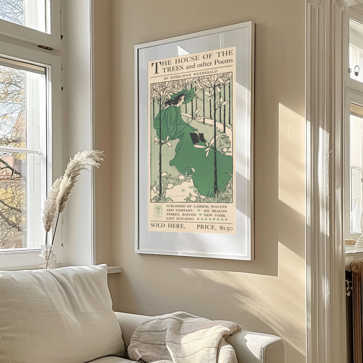 Framed art print of The House of the Trees and Other Poems by Ethelwyn Wetherald by Ethel Reed, in a sunlit living room above a sofa