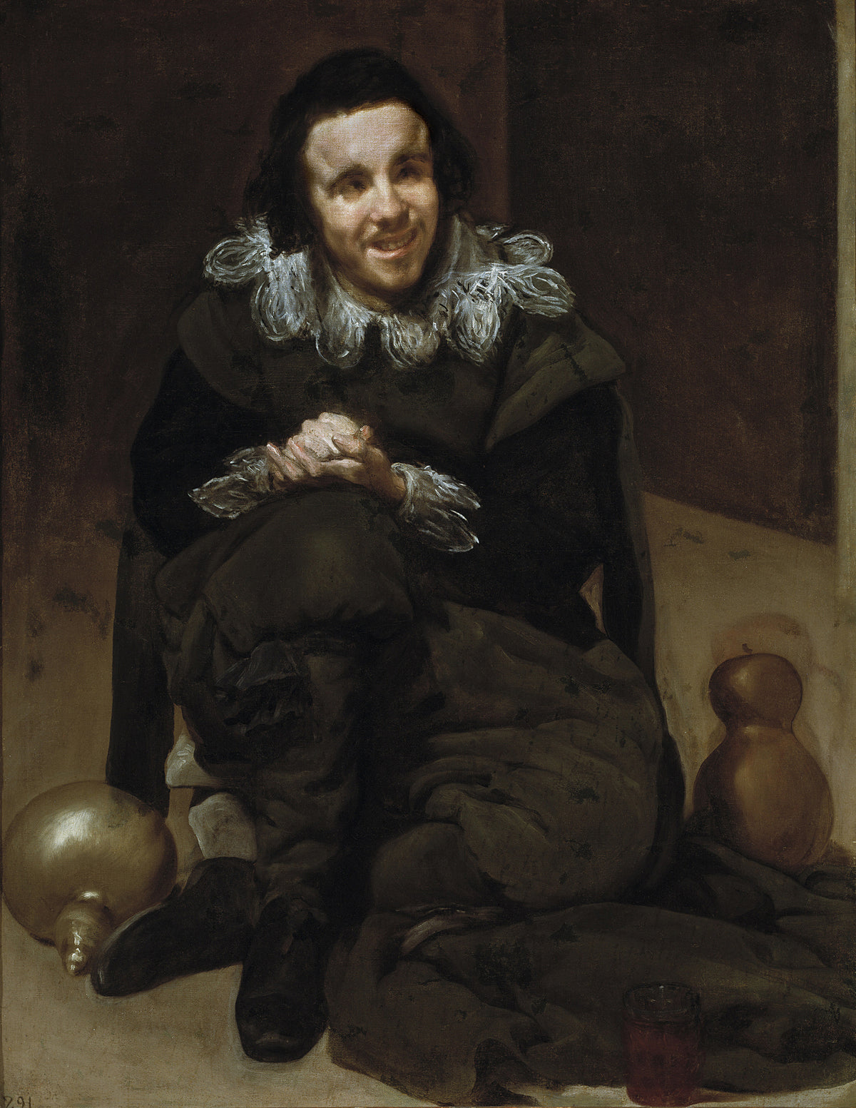 The Jester Calabacillas by Diego Velázquez — A grinning court jester sits low between a gourd and a flask