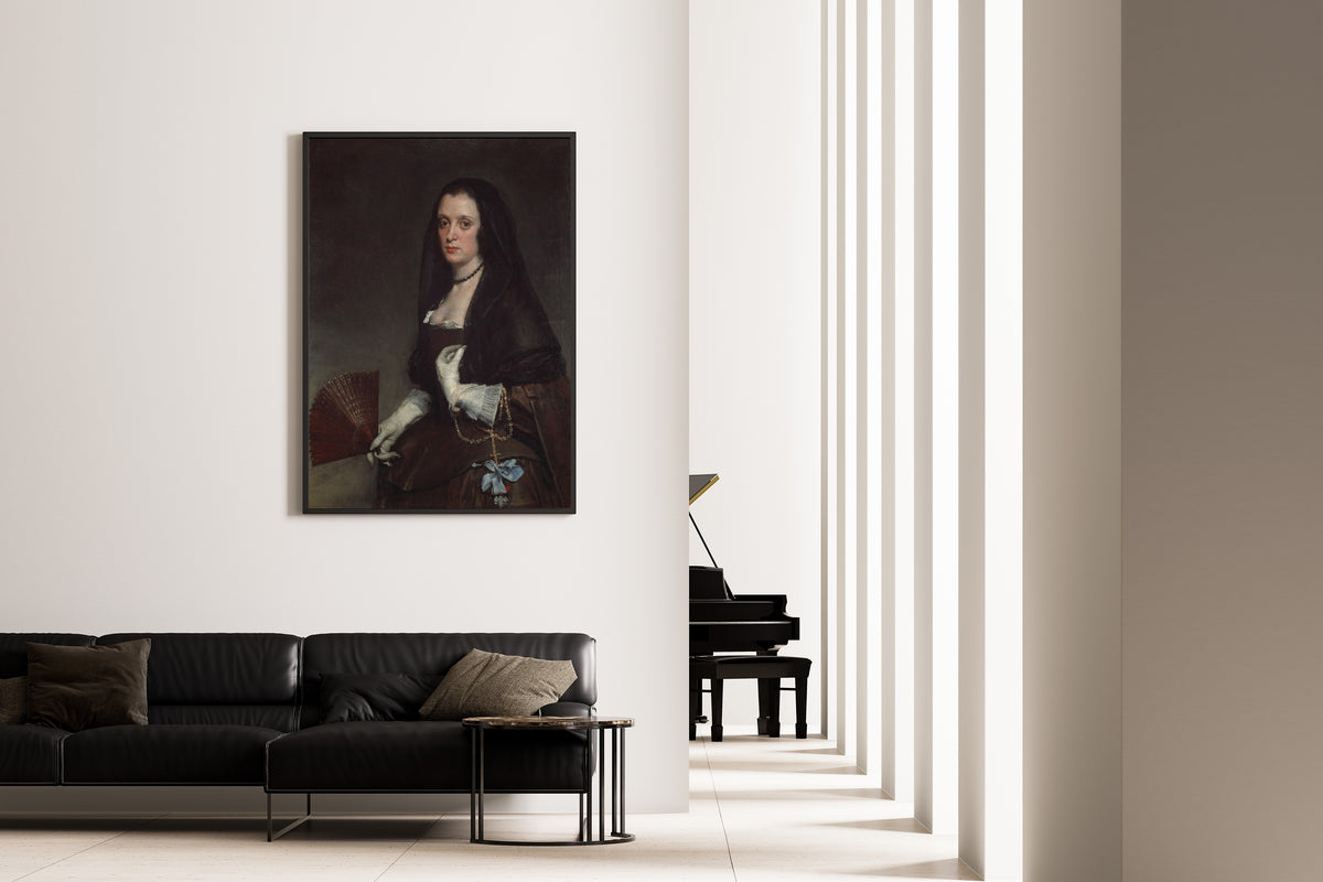 Framed art print of The Lady with a Fan by Diego Velázquez, on the wall of a minimal living room