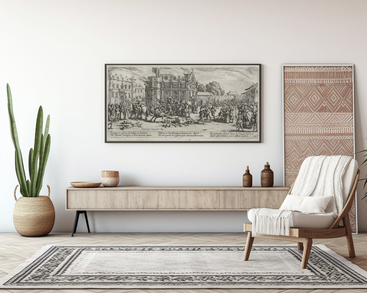 Framed art print of The Large Miseries of War: Devastation of a Monastery by Jacques Callot, above a sideboard in a living room