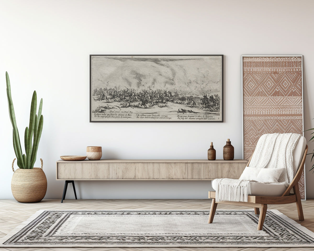 Framed art print of The Large Miseries of War: The Battle by Jacques Callot, above a sideboard in a living room