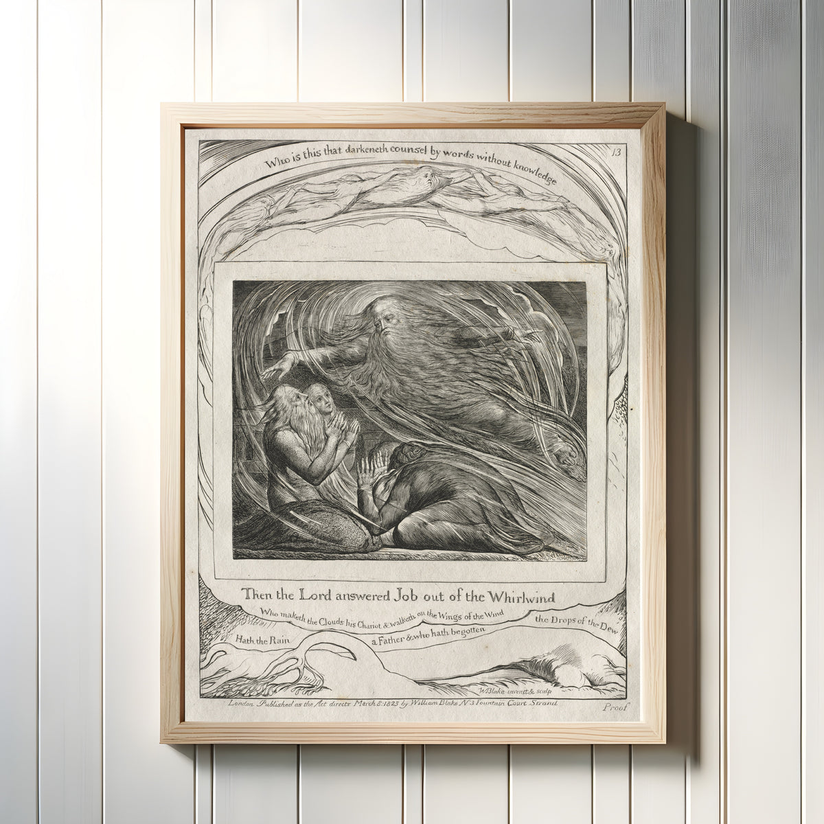 Framed art print of The Lord Answering Job out of the Whirlwind (Book of Job, Plate 13) by William Blake, in a light wood frame on a white panelled wall