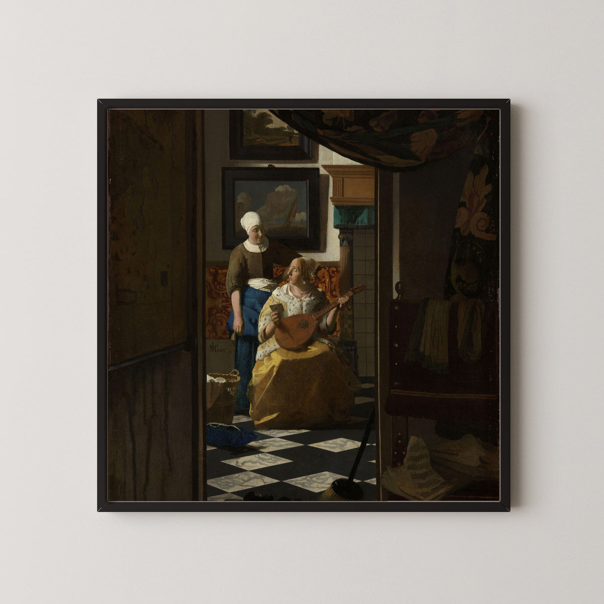 Framed art print of The Love Letter by Johannes Vermeer, in a black frame on a pale wall
