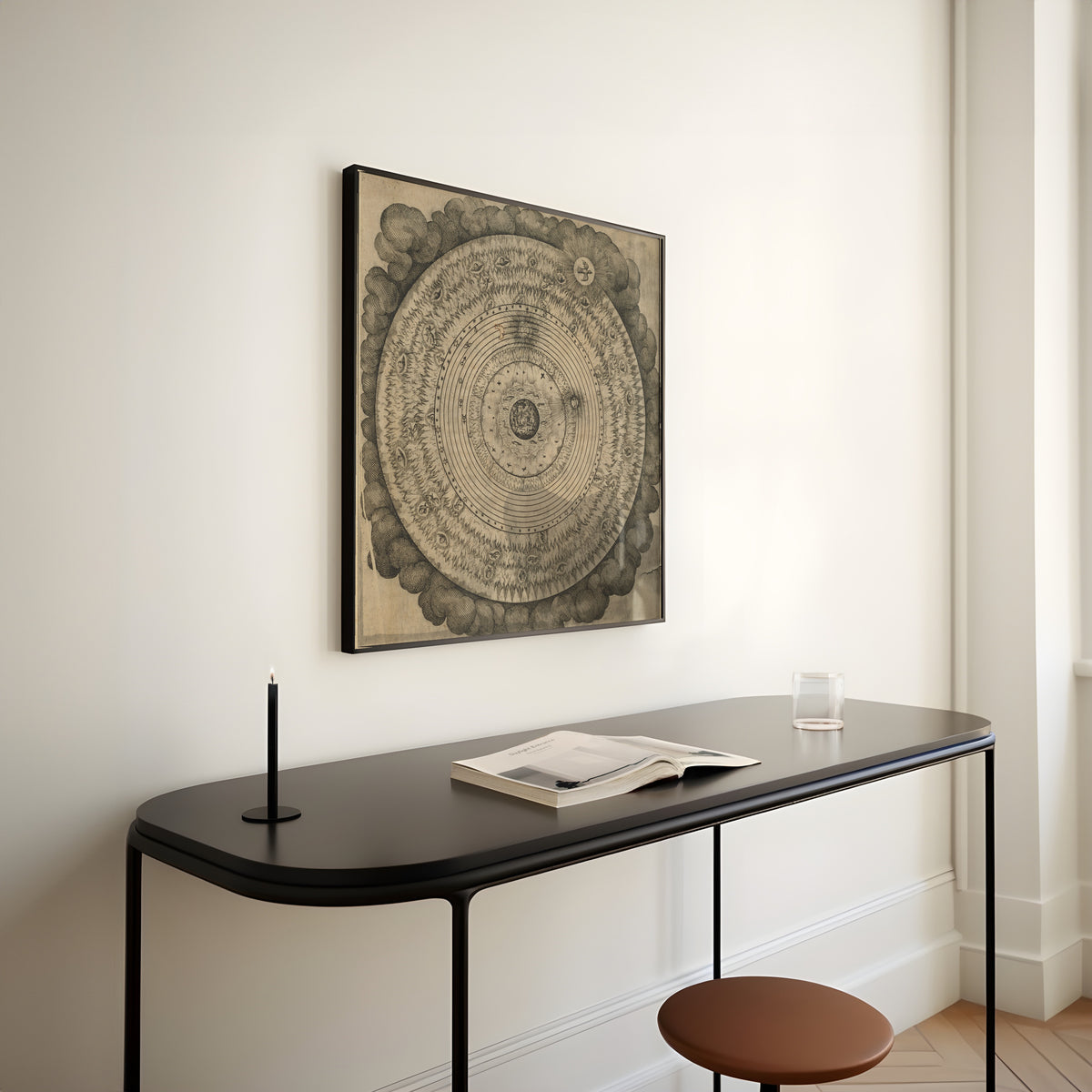 Framed art print of The Macrocosm: Concentric Spheres in Clouds (Utriusque Cosmi, Tractatus Primus) by Robert Fludd, above a slim black console table