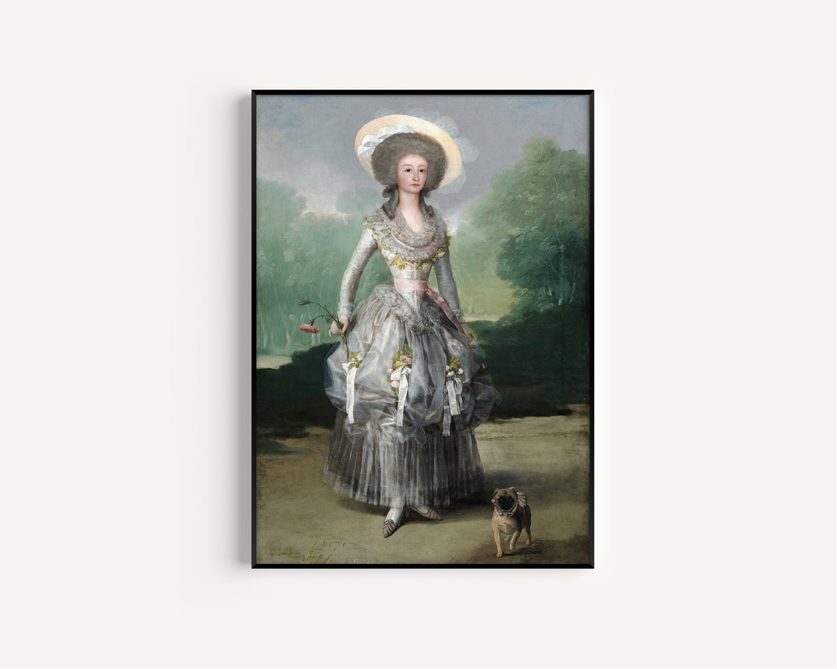 Framed art print of The Marquesa de Pontejos by Francisco de Goya, in a slim black frame on a plain white wall