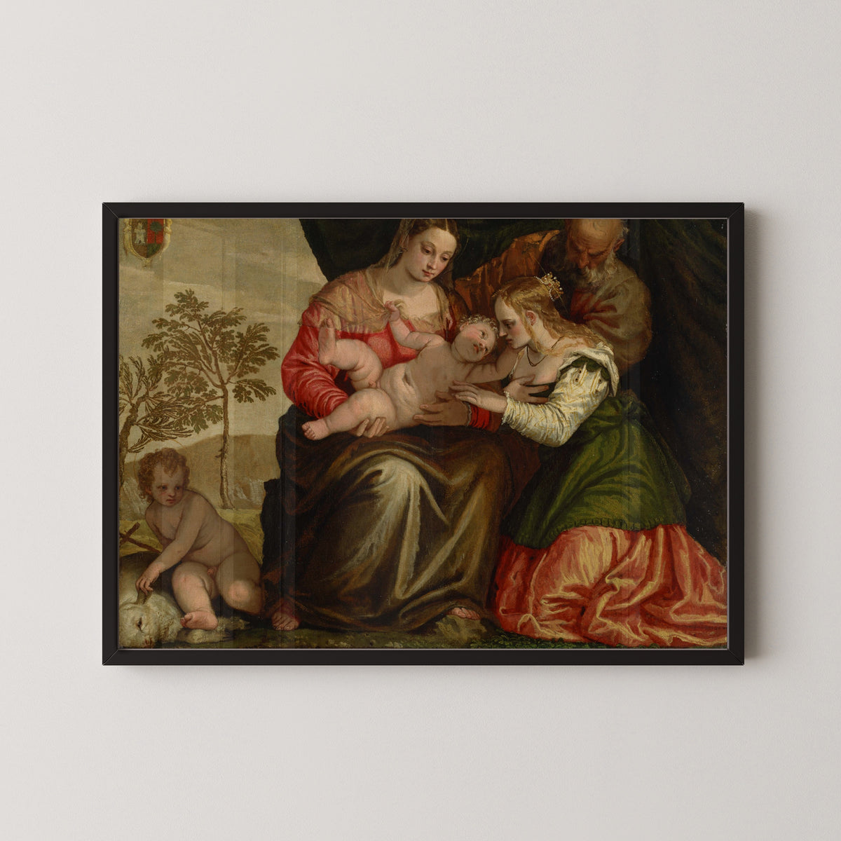 Framed art print of The Mystic Marriage of St. Catherine by Paolo Veronese, in a black frame on a pale wall
