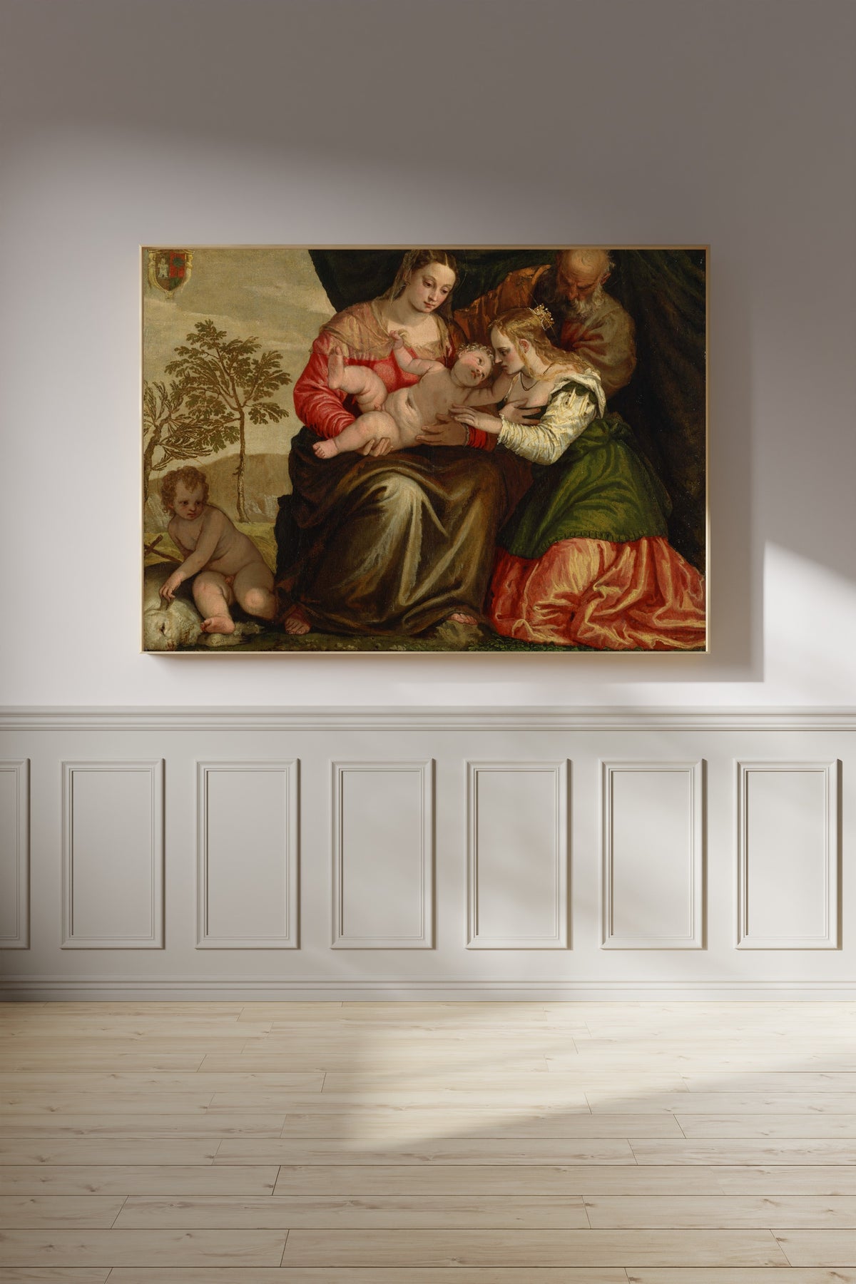 Framed art print of The Mystic Marriage of St. Catherine by Paolo Veronese, on a panelled wall in afternoon light