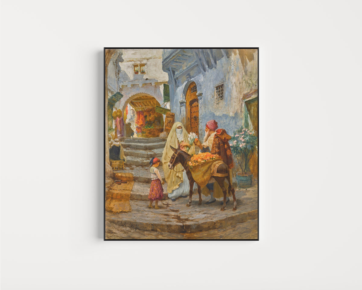 Framed art print of The Orange Seller by Frederick Arthur Bridgman, in a slim black frame on a plain white wall