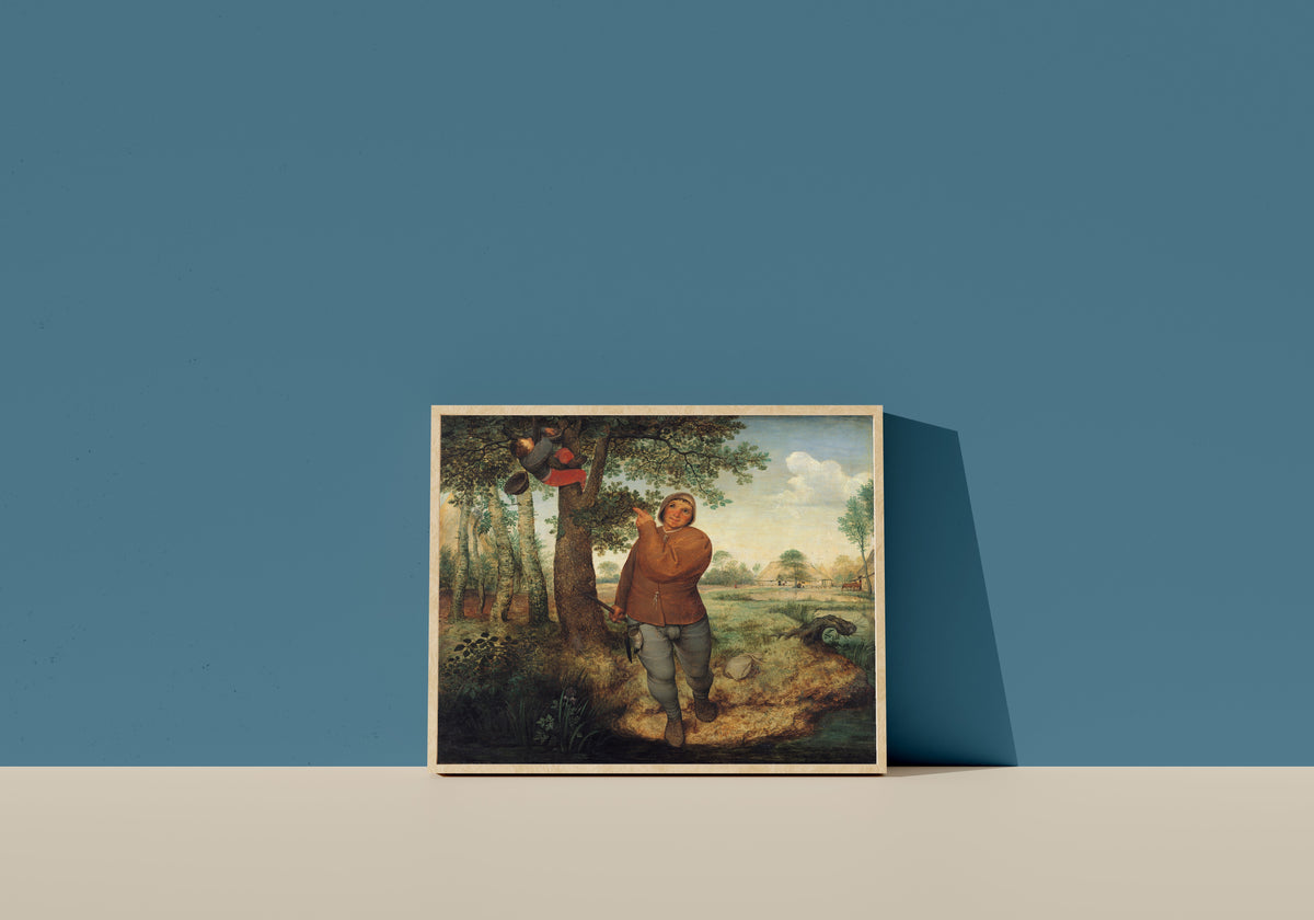 Framed art print of The Peasant and the Nest Robber by Pieter Bruegel the Elder, in a light wood frame leaning on a blue wall