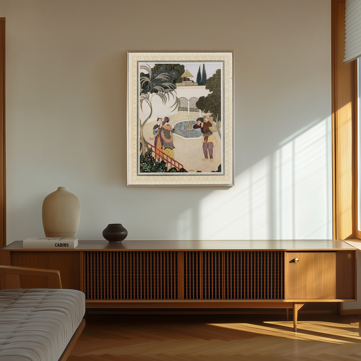 Framed art print of The Porter and the Ladies by Edmund Dulac, in a thin light frame on a sunlit wall above a wooden sideboard