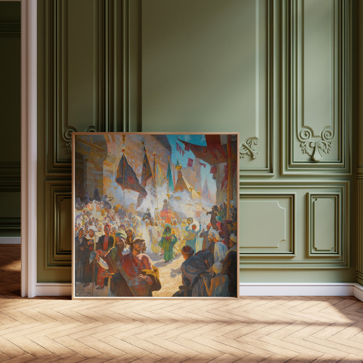 Framed art print of The Procession of the Mahmal through the Streets of Cairo by Ludwig Deutsch, leaning against olive-green panelling on a herringbone floor
