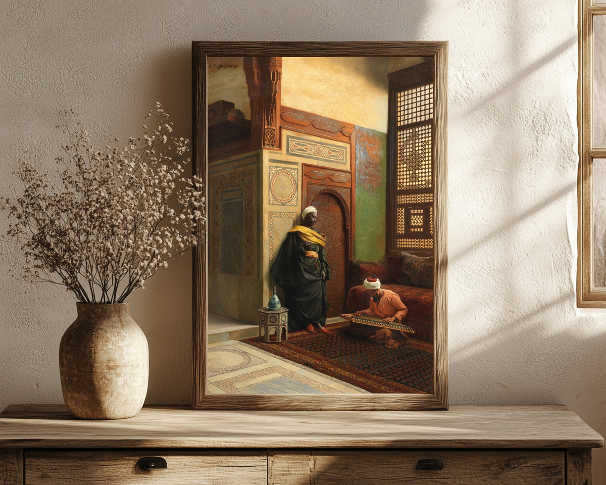 Framed art print of The Qanun Player by Ludwig Deutsch, in a dark wood frame leaning on a rustic console beside dried flowers