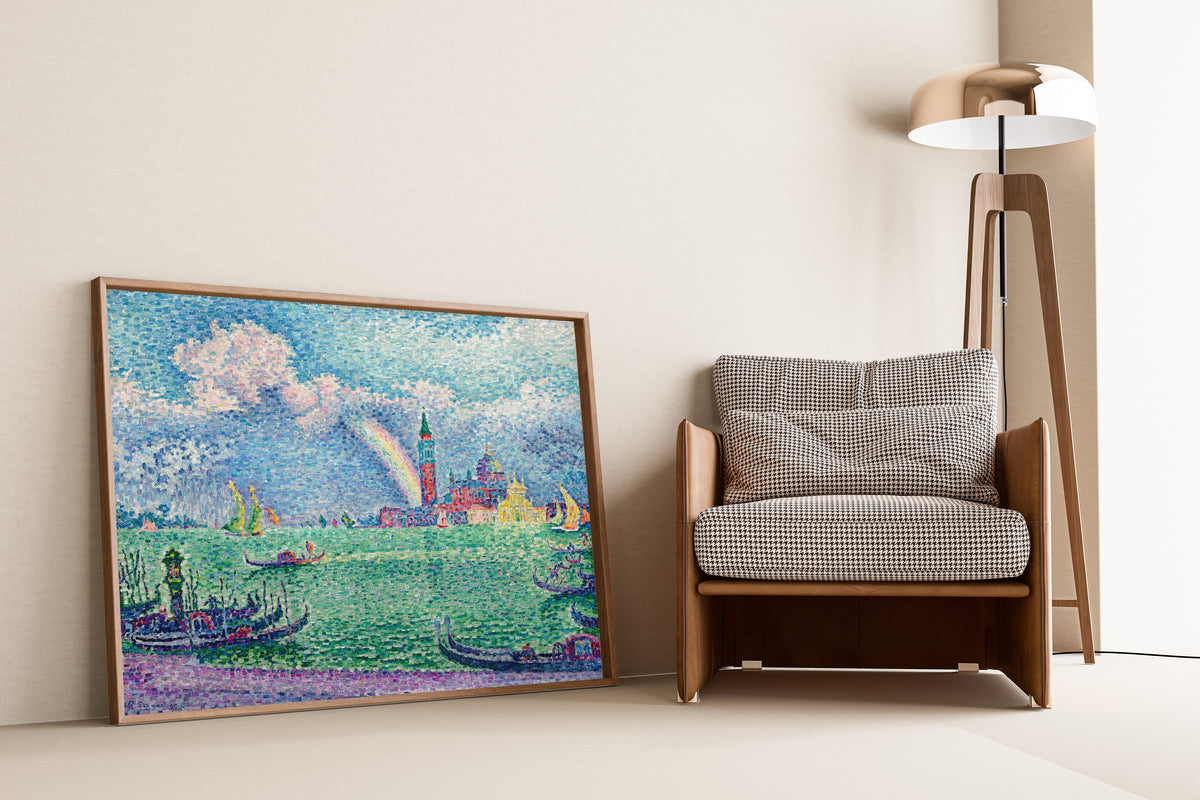 Framed art print of The Rainbow, Venice by Paul Signac, leaning against a wall beside an armchair and a floor lamp